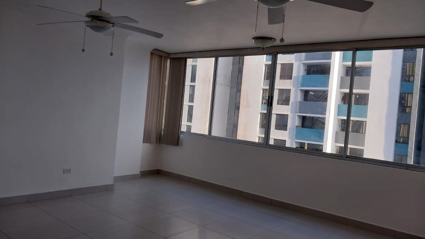 Spacious living room with large windows and ceramic floors in Condado Country Club Condado del Rey Panama