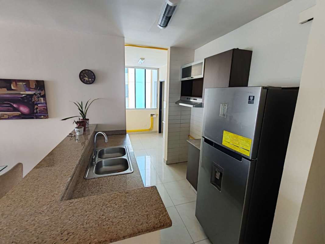 Apartment kitchen with granite countertops and stainless appliances at PH The Point Punta Paitilla Panama