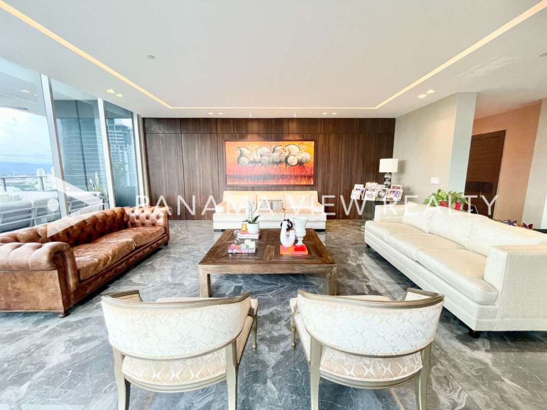 Chef's kitchen with marble island stainless appliances and city views PH Regalia