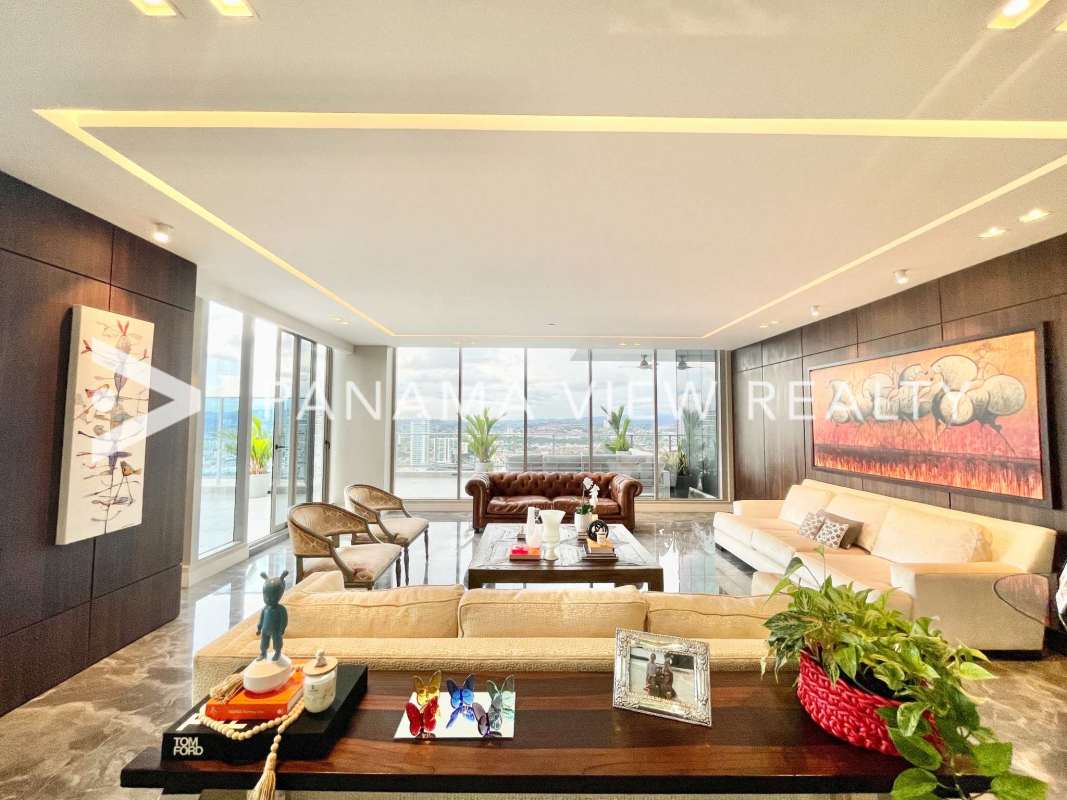 Luxurious bathroom with marble finishes double sinks glass enclosed shower PH Regalia