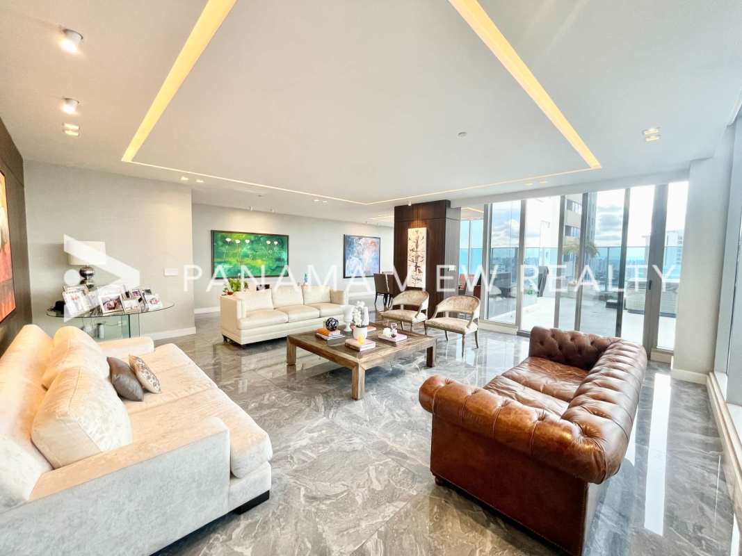 Family room with wood paneling, custom features and panoramic views PH Regalia Costa del Este