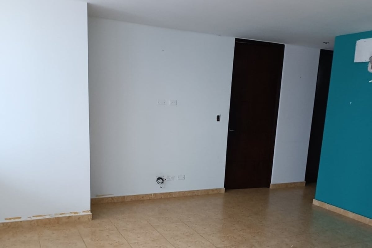 Bright living dining room with ceramic floors and balcony PH Torre El Dorado Panama City