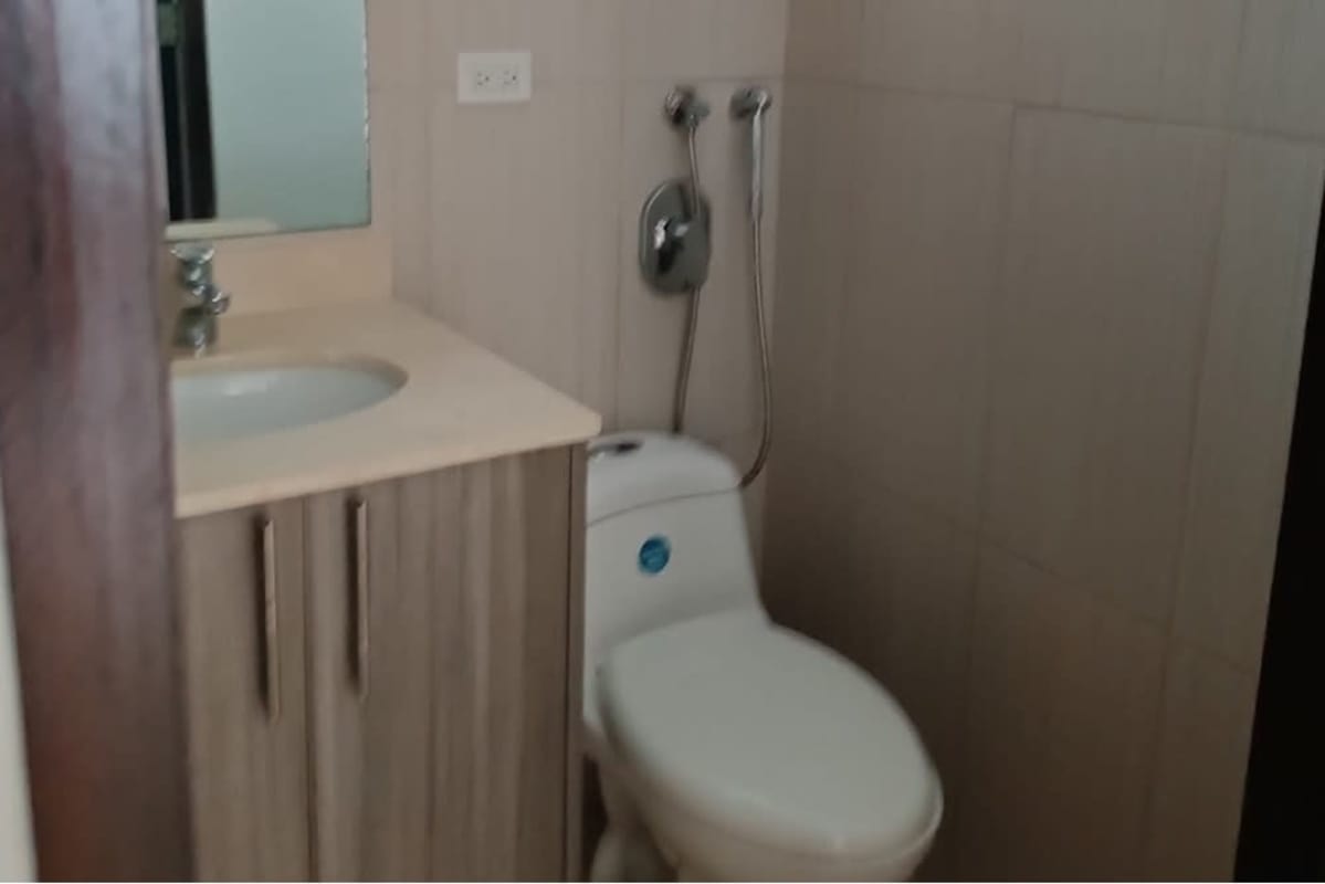 Bathroom with sink vanity mirror bidet sprayer PH Torre El Dorado Panama City