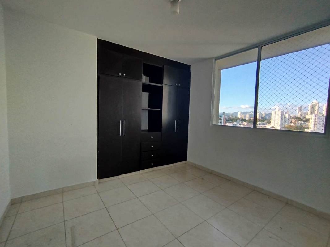 Spacious living area with beige tiles at PH Hyde Park near Parque Omar Panama City