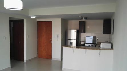 Living dining room with balcony access PH Midrise in Panama Pacifico