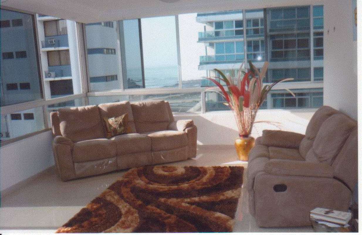 Living area with panoramic windows overlooking the Pacific in PH Bahia Marbella 2 Panama City