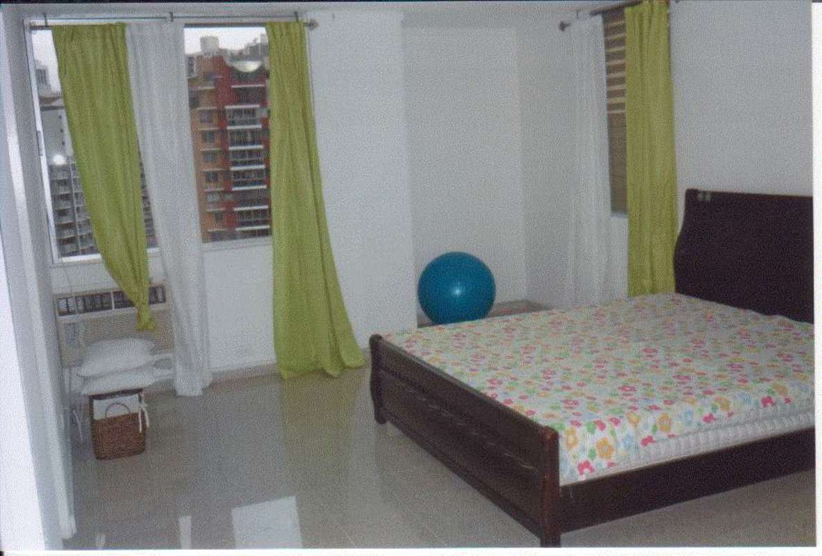 Cozy bedroom with window view and closet in PH Bahia Marbella 2 Panama City