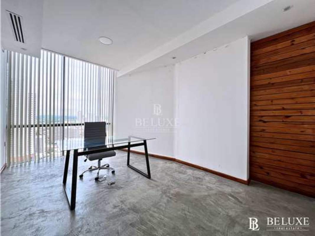 Meeting room with large windows and skyline view in Torre Generali Obarrio Panama City