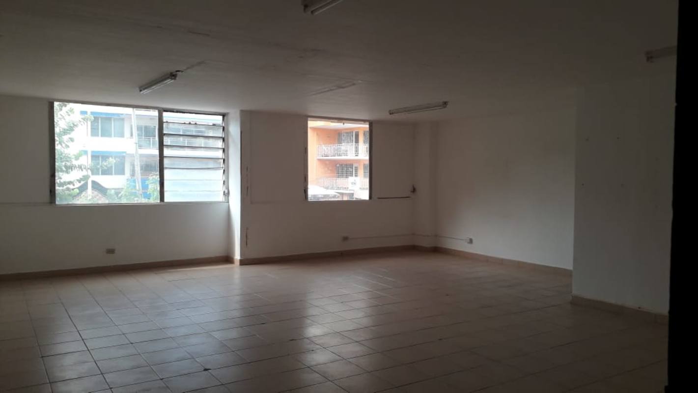 Empty open office space ready for rent with tiled floors and large windows in PH Bella Vista Panama