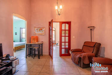 Second bedroom with large window, tile flooring and closet in Cuesta del Sol Panama