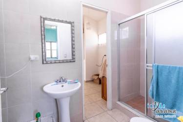 Bedroom with garden view window, tile floor, closet in condominium for sale David Panama