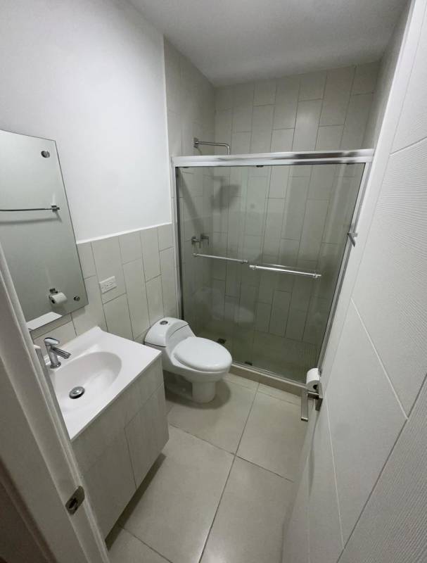 Modern kitchen with granite counters and stainless appliances at Villasur Residences Costa Sur Panama