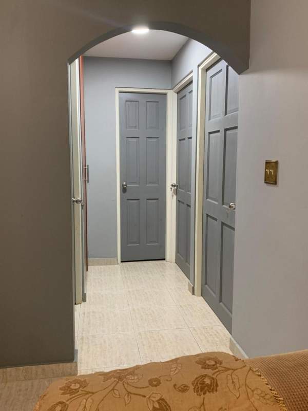 Interior hallway with multiple doors and recessed lighting house for sale Panama