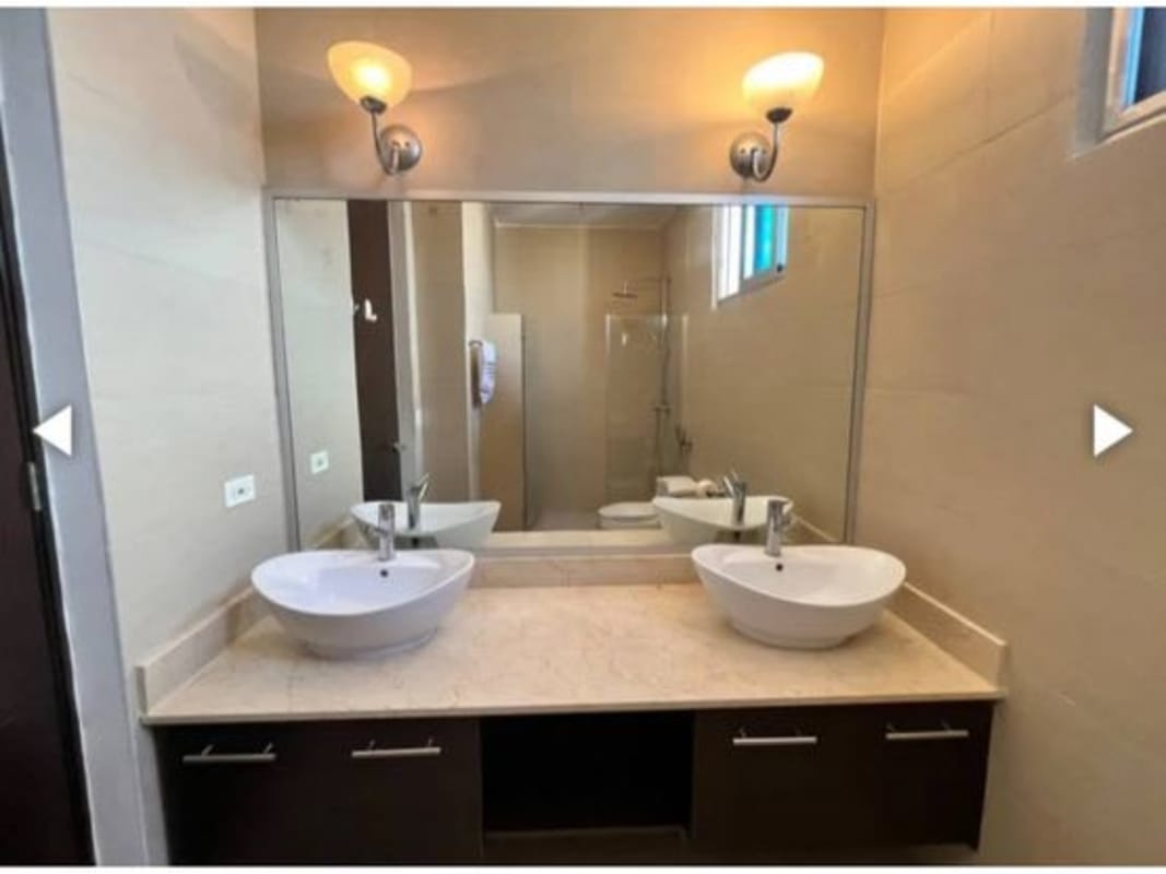 Elegant master bedroom overlooking ocean skyline in PH Sky Residences on Avenida Balboa