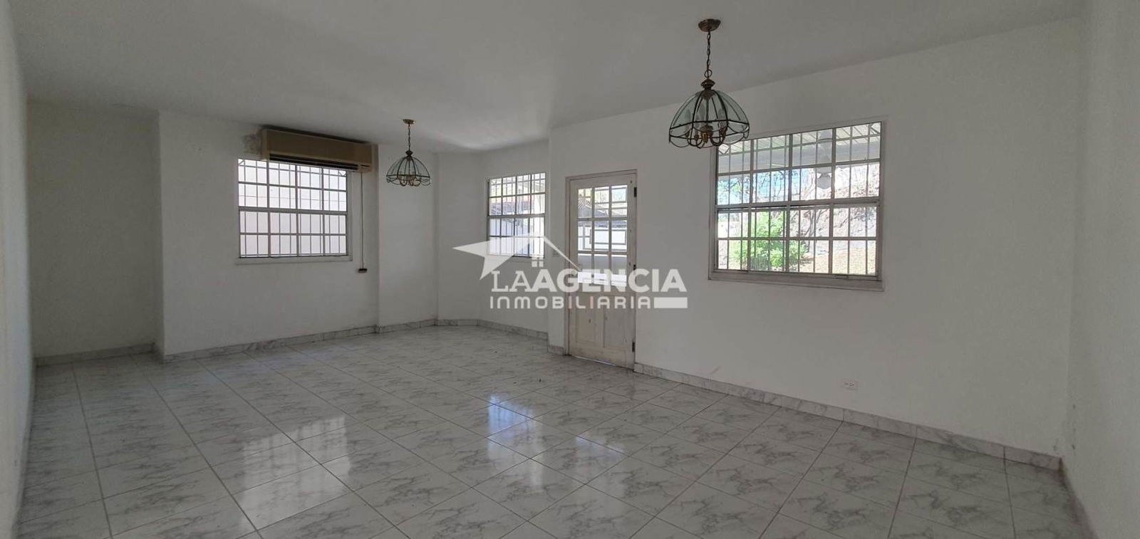 Kitchen granite counters built-in cabinets window stainless appliances Residencial El Doral Panama