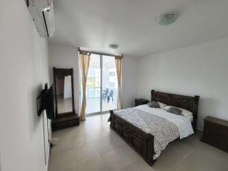 Giant saltwater pool and condo towers Playa Blanca Resort Panama