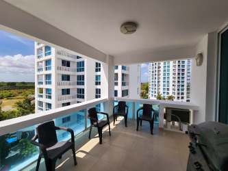 Open-concept living area with dining space in Playa Blanca Resort condo Coclé Panama