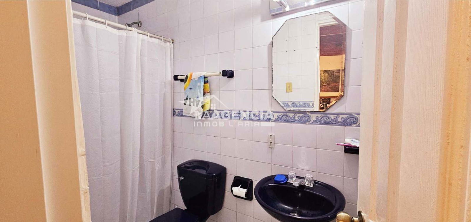 Family den or office area with natural light in Panama duplex house