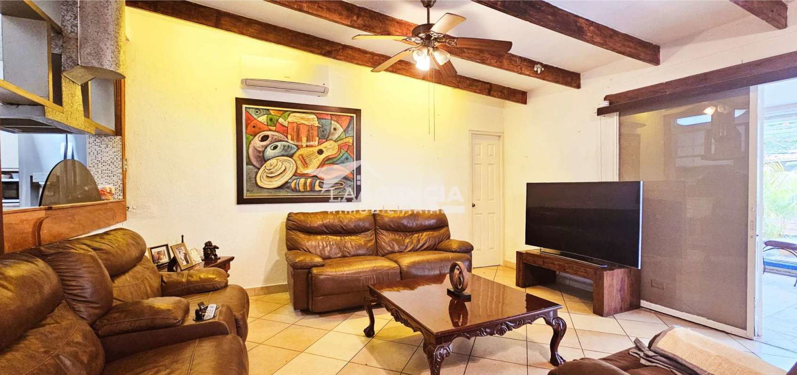 Front exterior duplex house with driveway, carport, landscaped yard Clayton Balboa