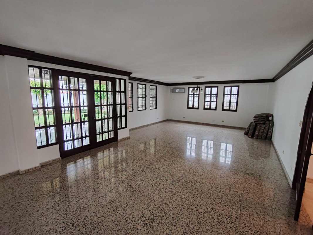 Bright spacious living room with terrazzo floors large windows in Altos del Golf luxury house Panama City