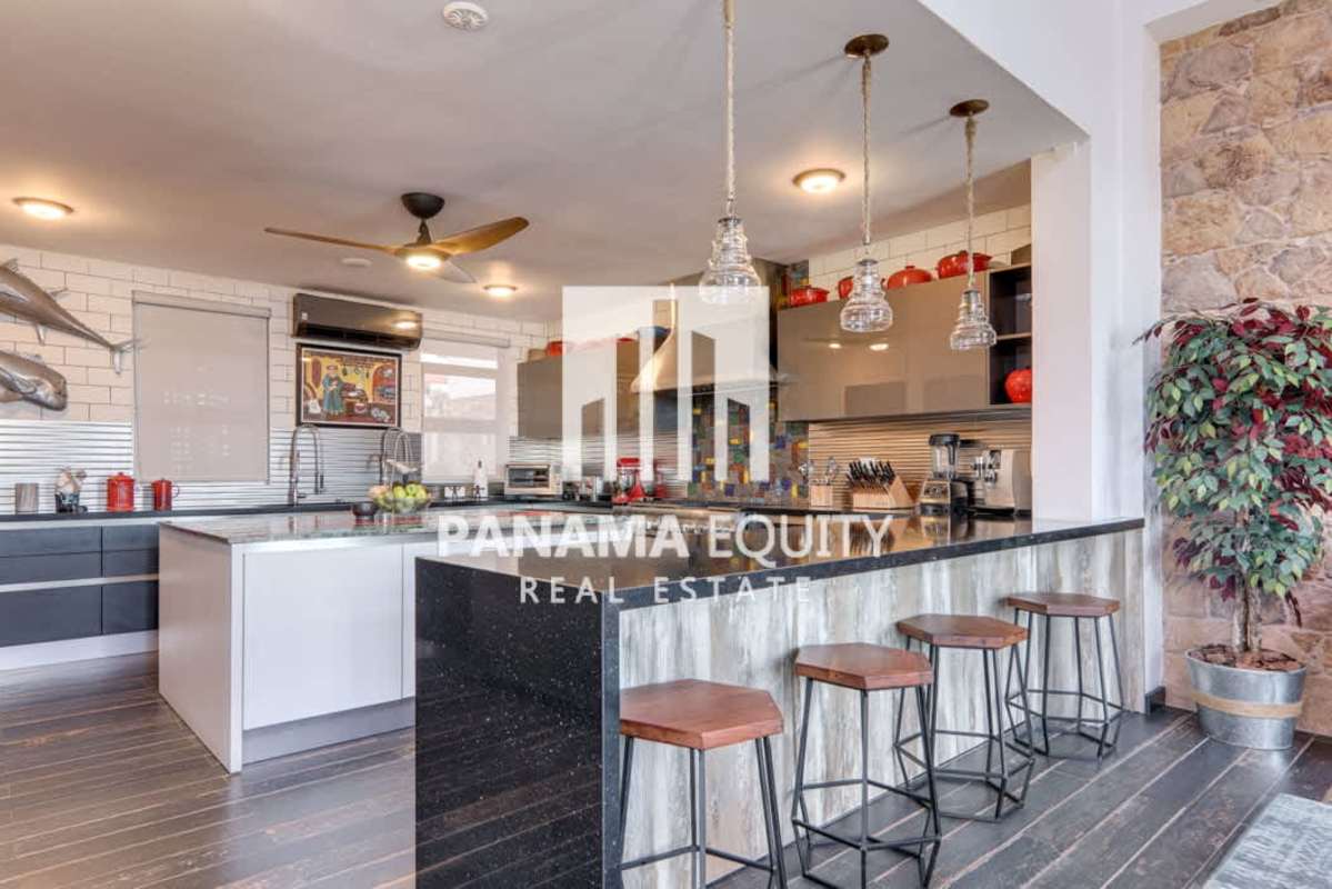 Modern dining space with artistic mural in luxury condo Casco Viejo Panama