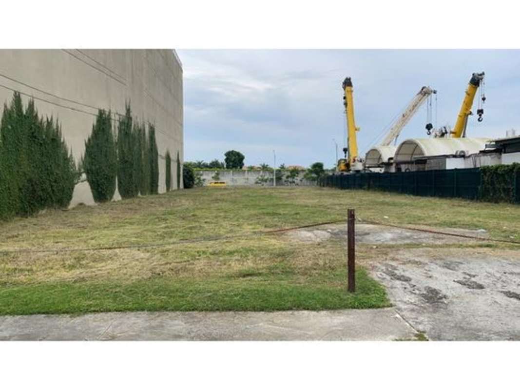 Aerial view luxury residential towers golf course water features Santa María Panama