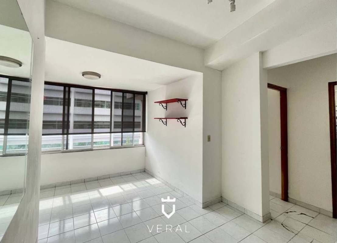 Bedroom with large windows and red shelves PH Brisas del Sur Panama City