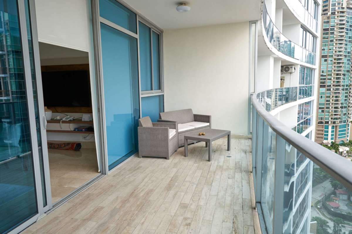 Contemporary kitchen with granite counters and stainless appliances in Punta Pacifica apartment