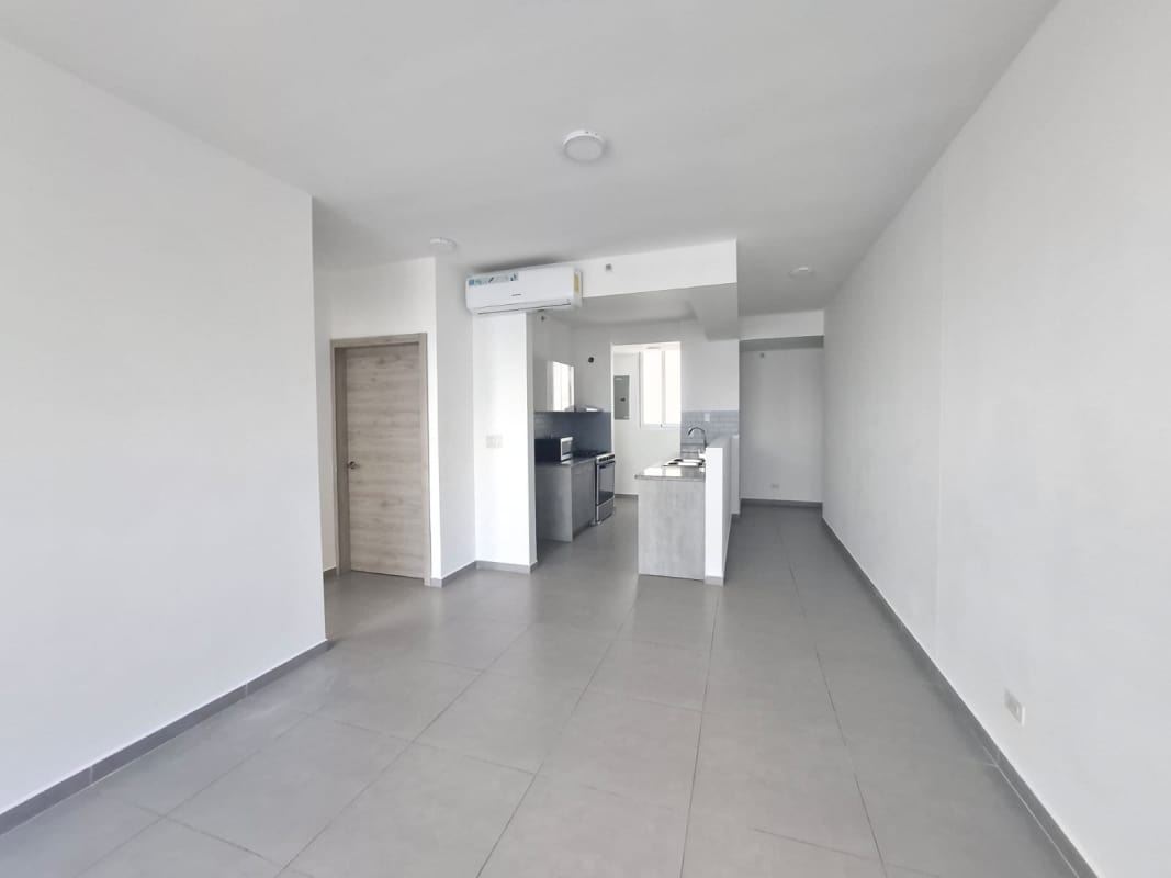 Modern semi-open kitchen with granite countertops and dining space at PH Signature Point La Cresta Panama City