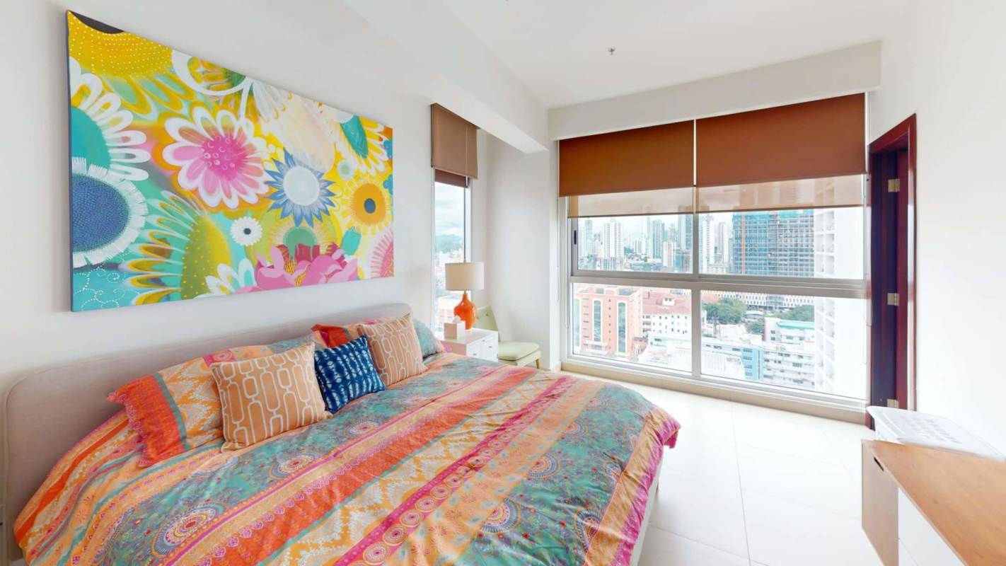 Bedroom featuring walk-in closet, ocean and city skyline view at Rivage Tower Panama