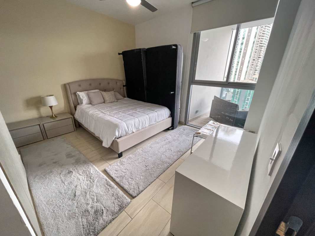 Spacious living room with floor-to-ceiling windows and ocean views Grand Tower Punta Pacifica Panama