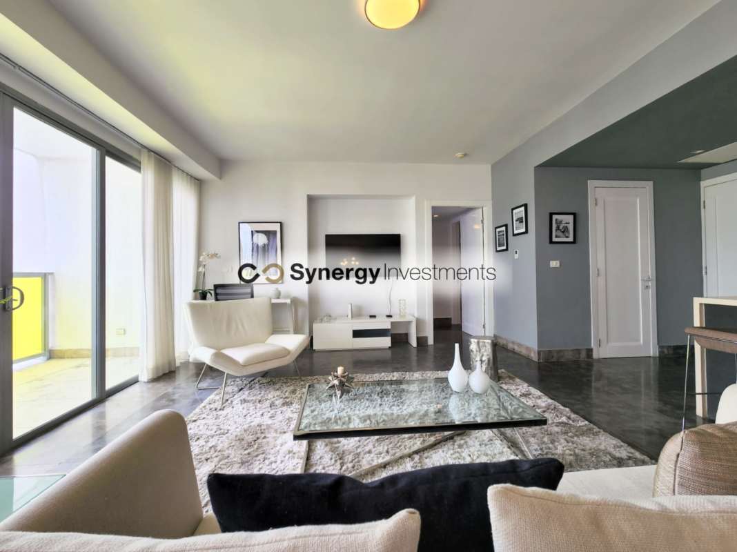 Modern integrated kitchen with dining area marble floors Yoo Panama Panama City