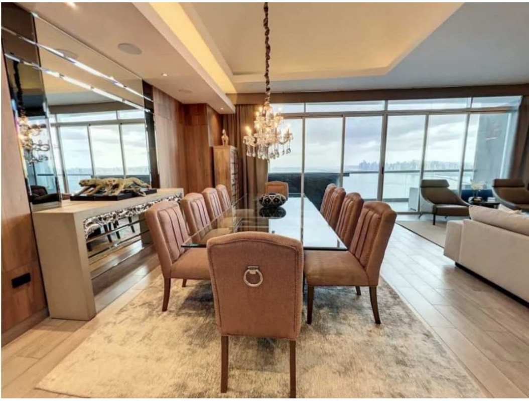 Remodeled kitchen with modern cabinets and appliances in PH Marea II Costa del Este Oceanfront Apartment