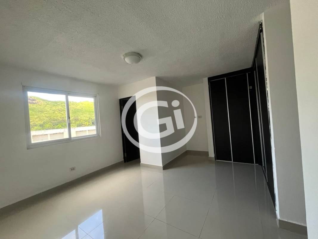 Second bedroom with sliding door closet in Altamira Gardens Ancón Panama apartment for sale