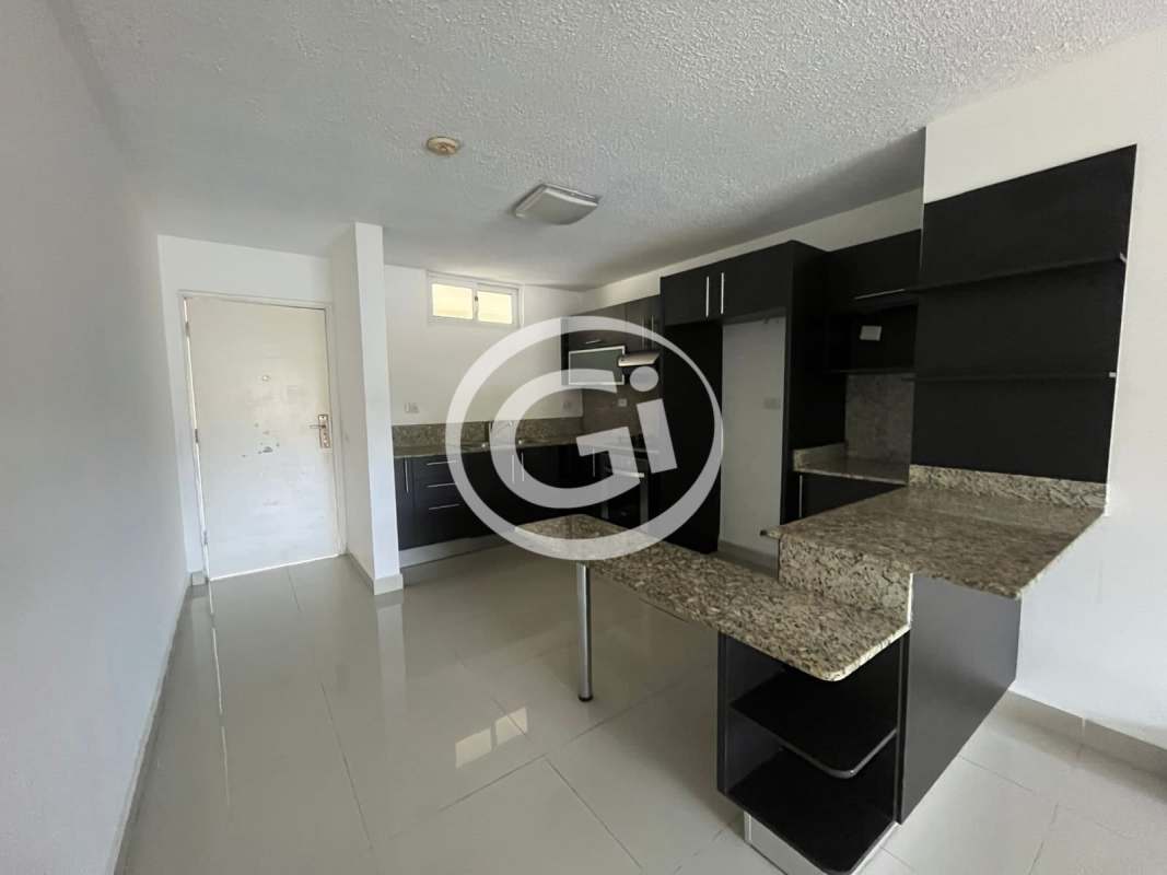 Bedroom with large window and black built-in closet Altamira Gardens Panama City Ancón