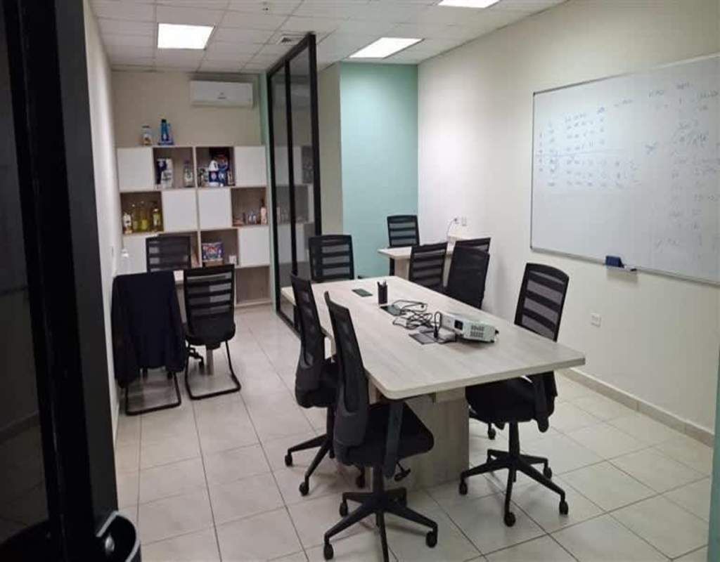 Corporate meeting space with chairs, tables, modern design at logistics warehouse Panama