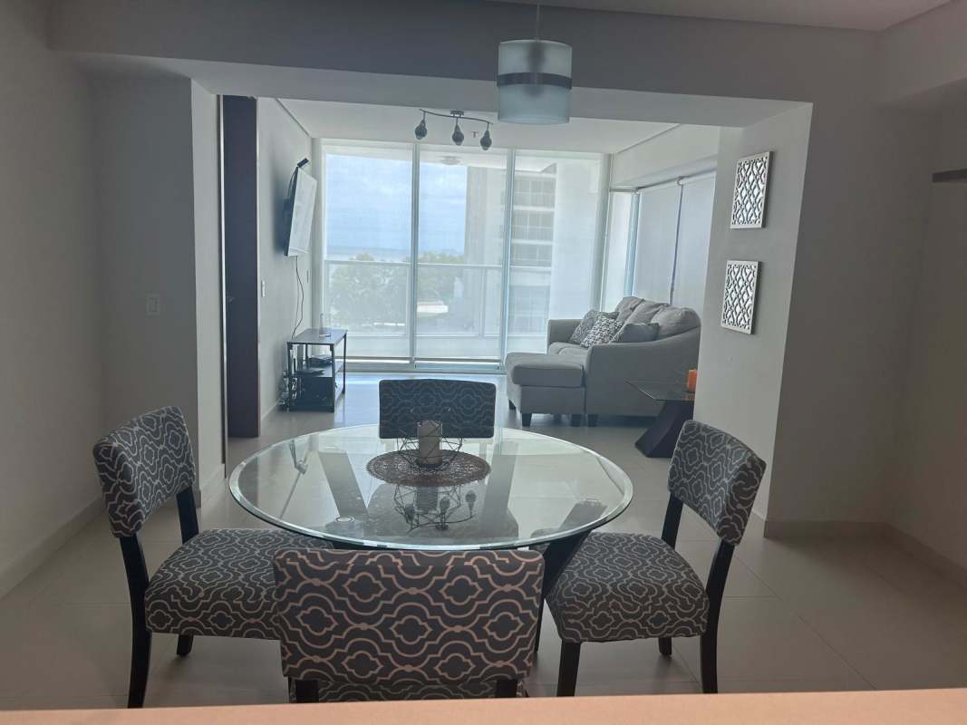 Modern furnished living and dining with large windows bright space Costa del Este apartment for rent