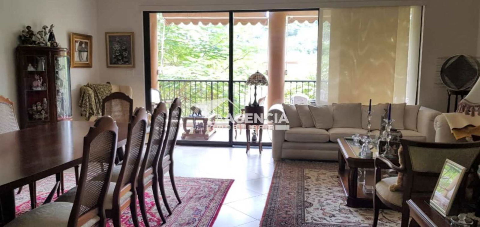 Contemporary kitchen granite counters wood cabinetry Embassy Club Apartments Clayton Panama