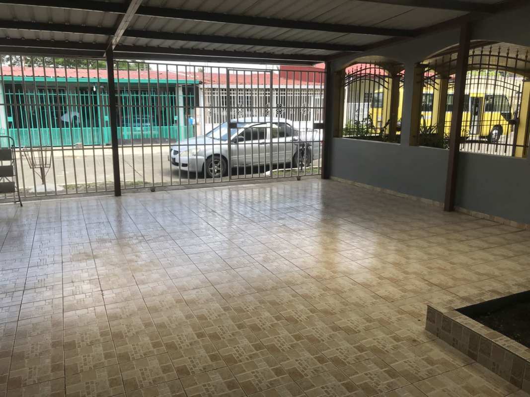 Covered porch with gates and security features Campo Lindbergh Don Bosco