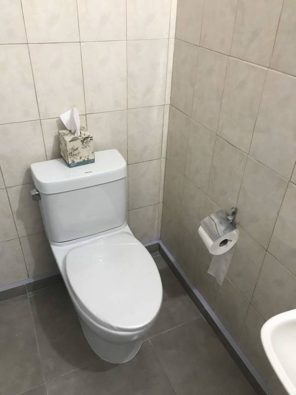 Small bathroom with ceramic tiles and basic fixtures Don Bosco Panama