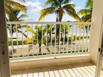 Fully equipped kitchen with tile floors, appliances, laminate counters in oceanfront condo Playa Dorada Veracruz Panama