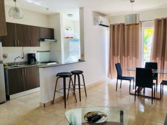 Master bedroom with bed, air conditioning, ocean view window, modern decor Playa Dorada Panama