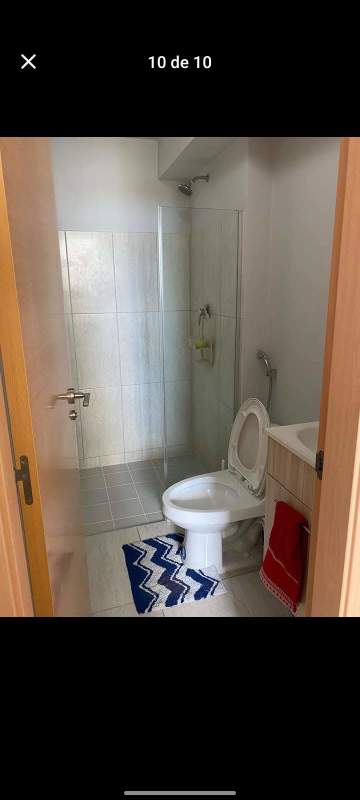 Cozy master bedroom furnished with bed, large window, and built-in closet at PH Bella Natura Los Andes