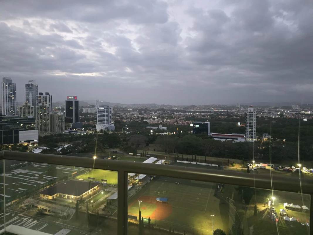 Panoramic balcony view of city skyline from PH Parque del Mar Costa del Este furnished apartment