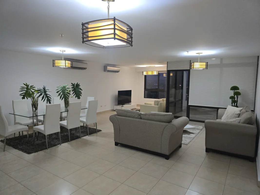 Spacious open living dining room in luxury furnished apartment PH Parque del Mar Panama City
