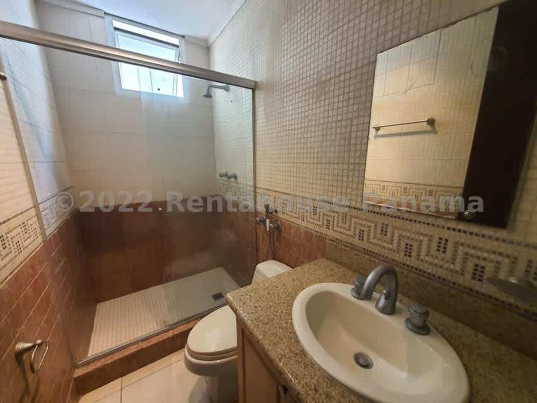 Secondary bedroom with closet, neutral walls and city view PH Costa Pacifica Panama