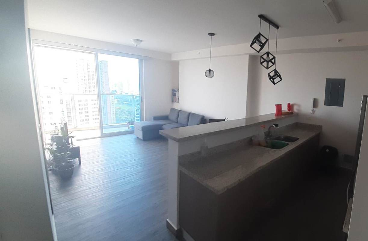 Living area with dining space open kitchen and balcony PH San Roque Panama