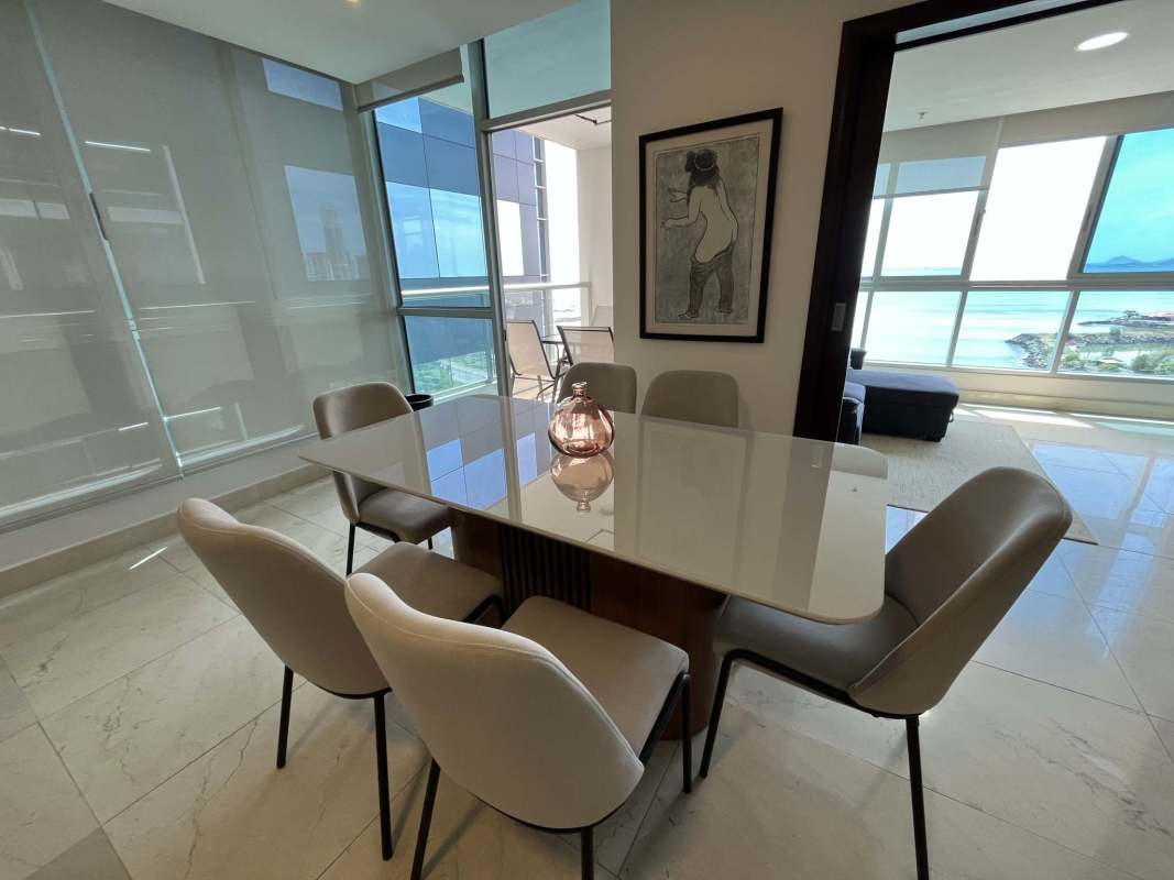 Modern living and dining space with ocean views in PH YOO on Avenida Balboa Panama City