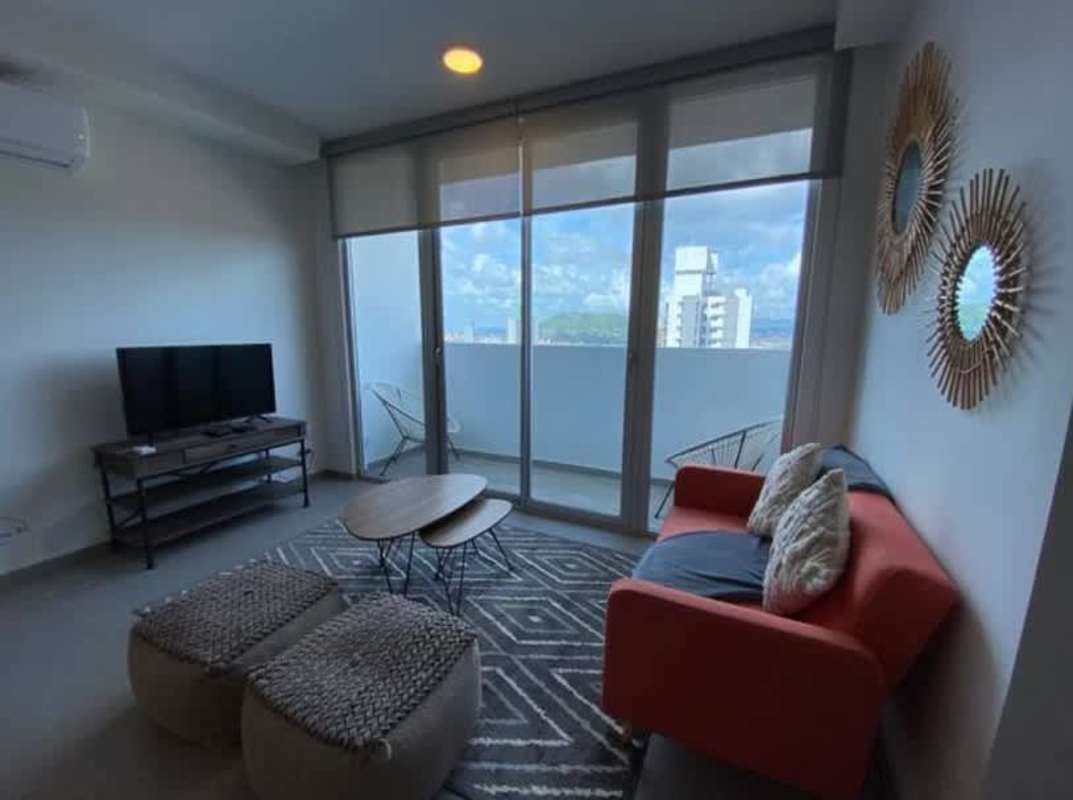 Semi-open kitchen with granite counters, window and appliances at PH Signature Point La Cresta Panama