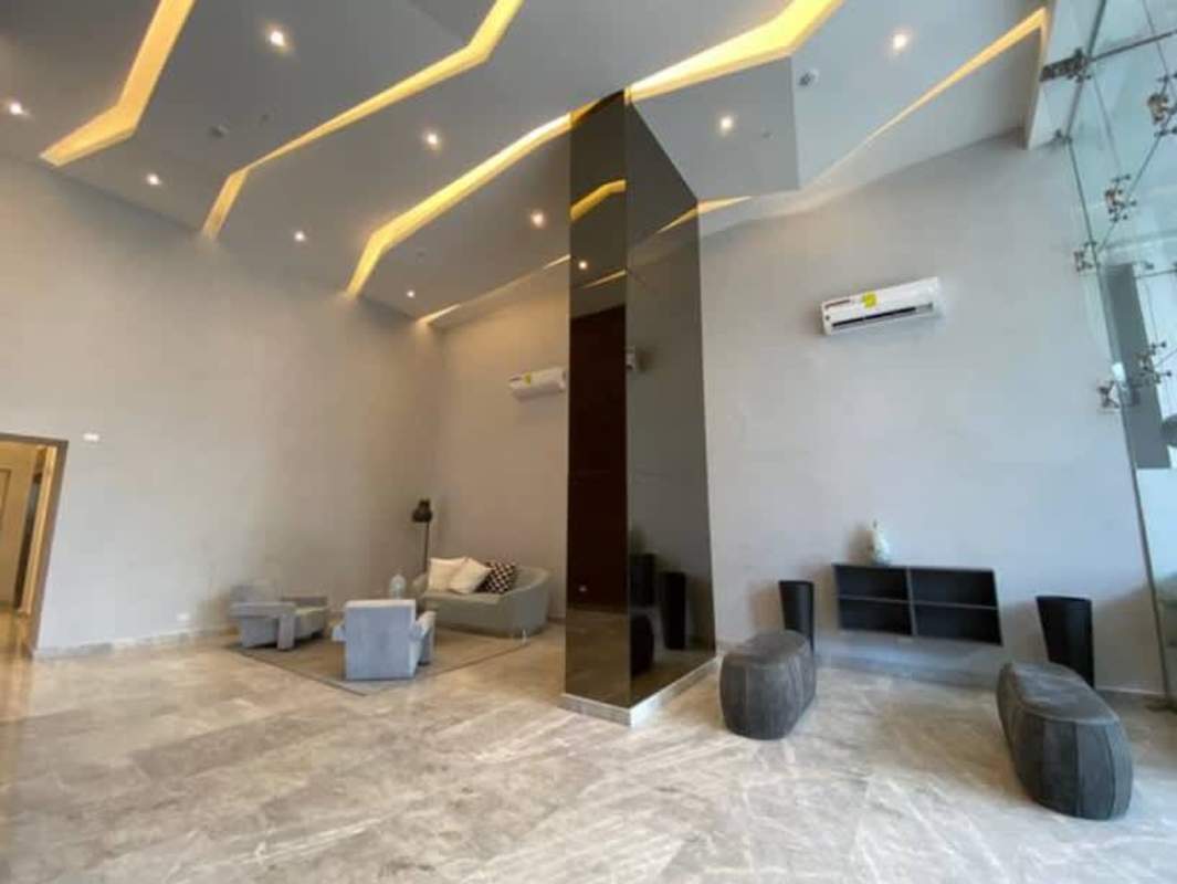 Elegant lobby with seating and modern decor at PH Signature Point Bella Vista Panama City